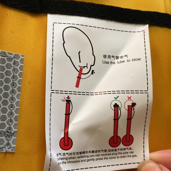 Life jacket. Never worn. New with tags. Manual inflatable jacket - Picture 11 of 13